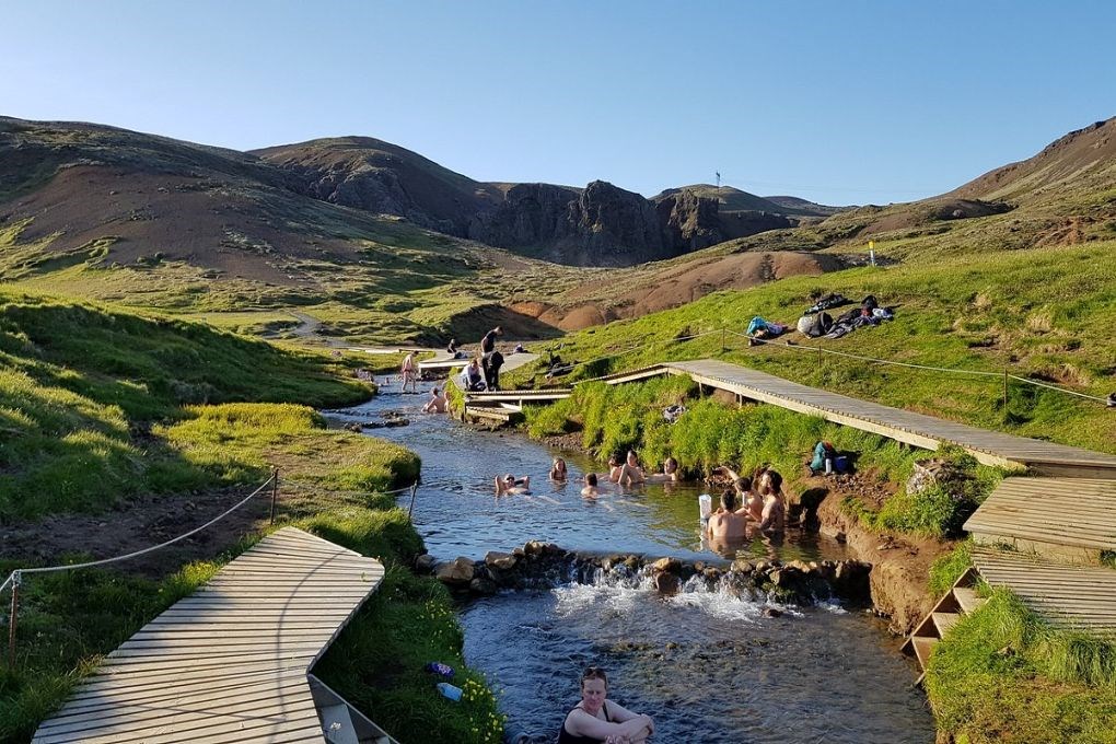 Hot spring bathing is a must activity in Iceland in summer