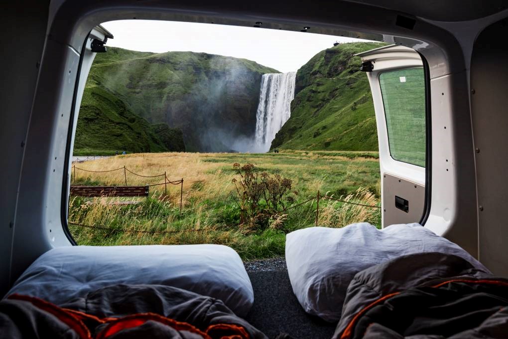 Wake up with the view and sound of Skogarfoss at Skogar campsite